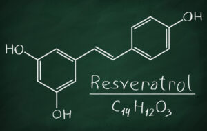 The chemical structure of resveratrol written on a chalkboard.